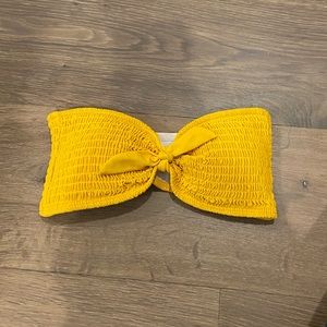 yellow strapless swim suit top! size small